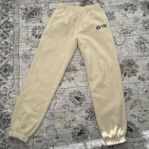 Brandy Melville/ John Galt sweatpants that say New York